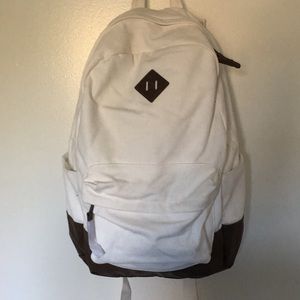 White canvas backpack